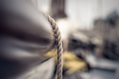 Close-up of rope tied on metal