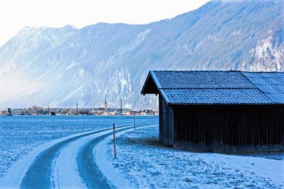 Scenic view of field against mountain