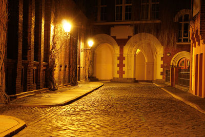 Yard of building at night