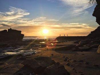 Scenic view of sea at sunset