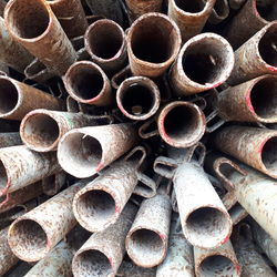 Full frame shot of logs in forest