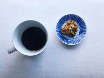 High angle view of coffee cup on table