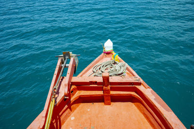 High angle view of boat sailing in sea