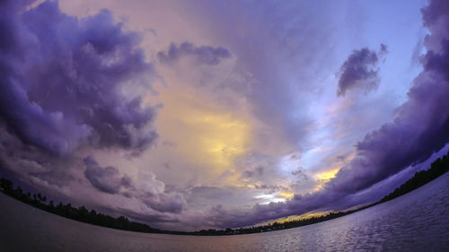 Low angle view of dramatic sky during sunset