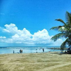 Scenic view of sea against blue sky