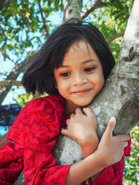 Portrait of cute girl smiling