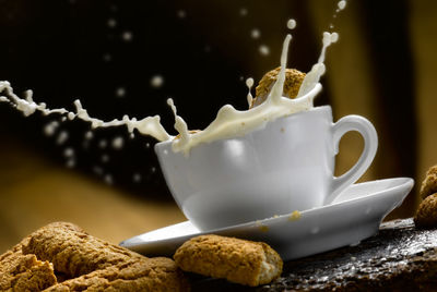 Close-up of coffee cup on table