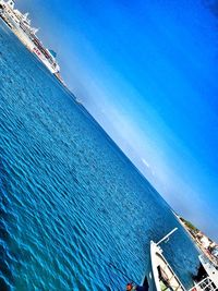 Scenic view of sea against blue sky