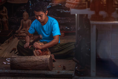 Man working in shopping mall