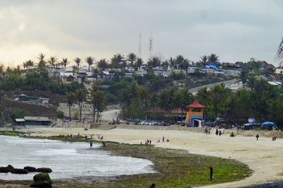 High angle view of people by buildings in city