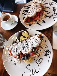 High angle view of cake in plate on table