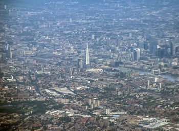 Overlooking the urban sprawl of the city of london from an airplane