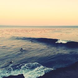 Scenic view of sea at sunset