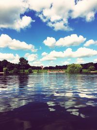 View of lake against cloudy sky