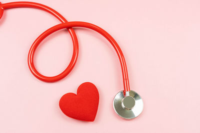 High angle view of heart shape decoration on white background