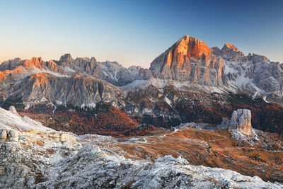 Rock formations on mountain against sky