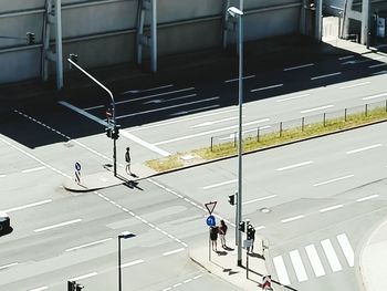 High angle view of people walking in city