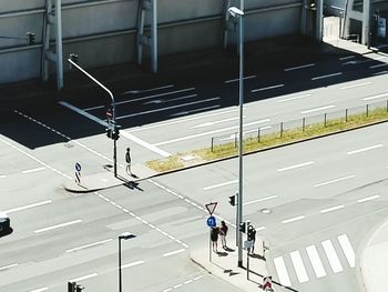 High angle view of people walking in city