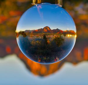 Reflection of crystal ball on glass