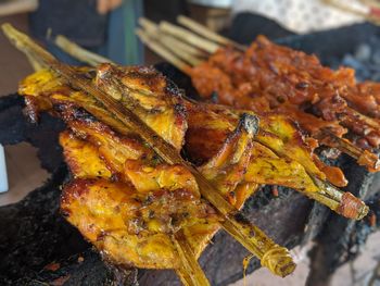 High angle view of meat on barbecue grill