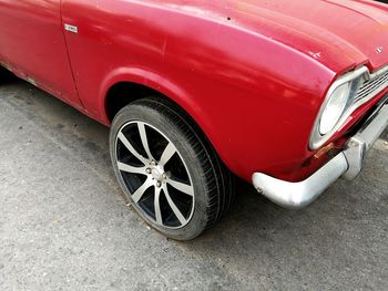 High angle view of red car on street