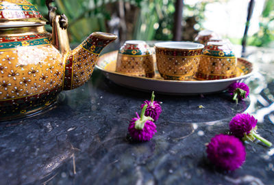 Close-up of purple flowers on table