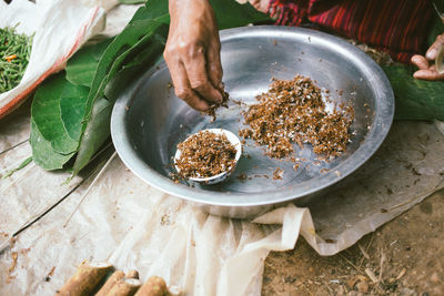 High angle view of person preparing food