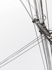 Low angle view of electricity pylon