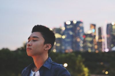 Close-up of man against sky