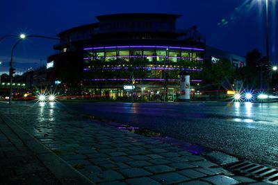 Illuminated street at night