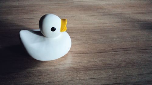 High angle view of stuffed toy on wooden table