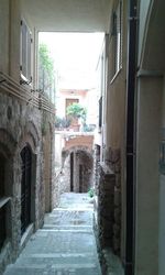 Narrow alley along buildings