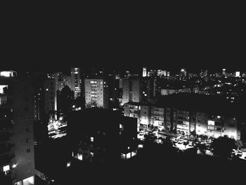 High angle view of illuminated buildings at night