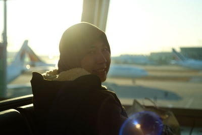 Close-up of man sitting in bus