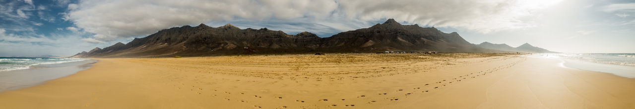 Panoramic view of beach against sky