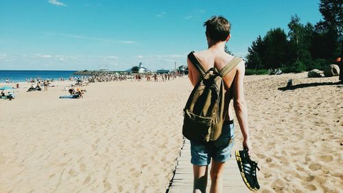 Woman standing on beach