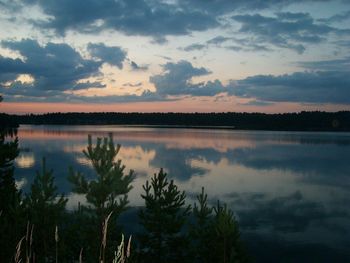 Scenic view of lake at sunset