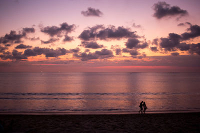Scenic view of sea at sunset