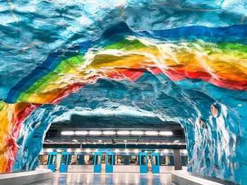 Low angle view of illuminated subway station