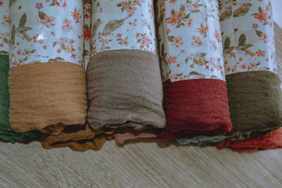 Close-up of multi colored blanket on bed at home