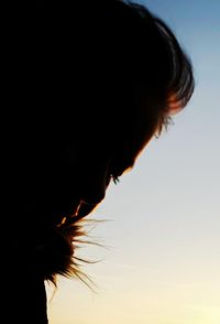 Close-up of woman against sky