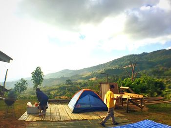 View of tourist resort against cloudy sky