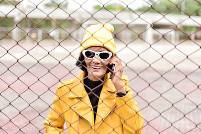 Portrait of a smiling young woman outdoors