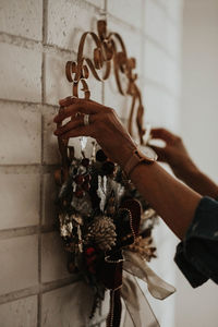 Close-up of woman holding hand