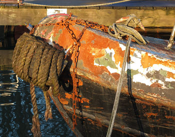 Old rusty tied to fishing boat