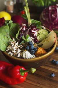 Close-up of fruits in bowl on table