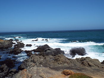 Scenic view of sea against clear sky