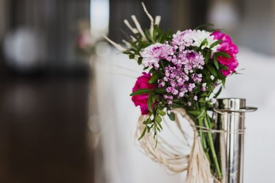 Close-up of pink flower pot on table