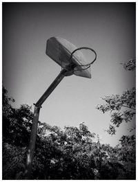 Low angle view of street light against sky