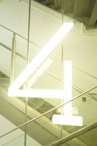 Low angle view of illuminated staircase in building